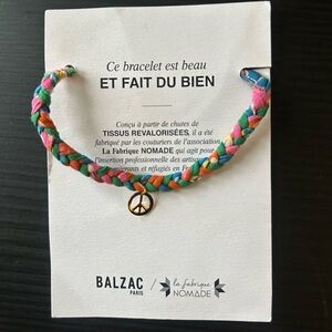 BALZAC Paris Multicolor Braided Peace Charm Fabric Bracelet -Pink,Green & Orange